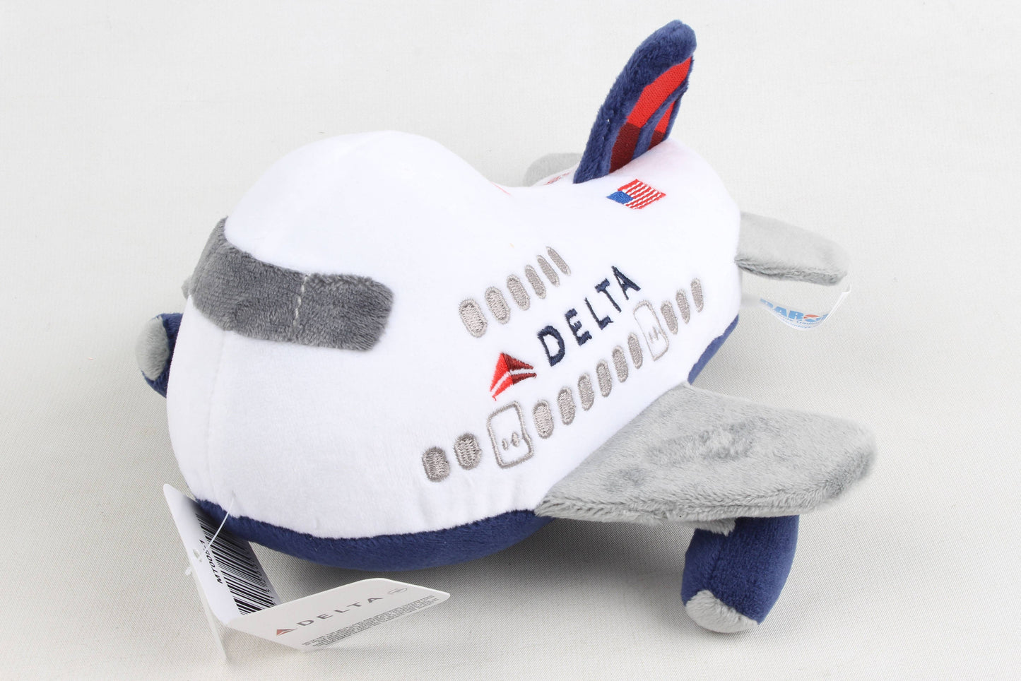 MT005-1 Delta Airlines Plush airplane by Daron toys.