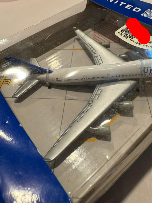 Older United Airlines Boeing 747-400 plane RLT 6264 old price sticker on box